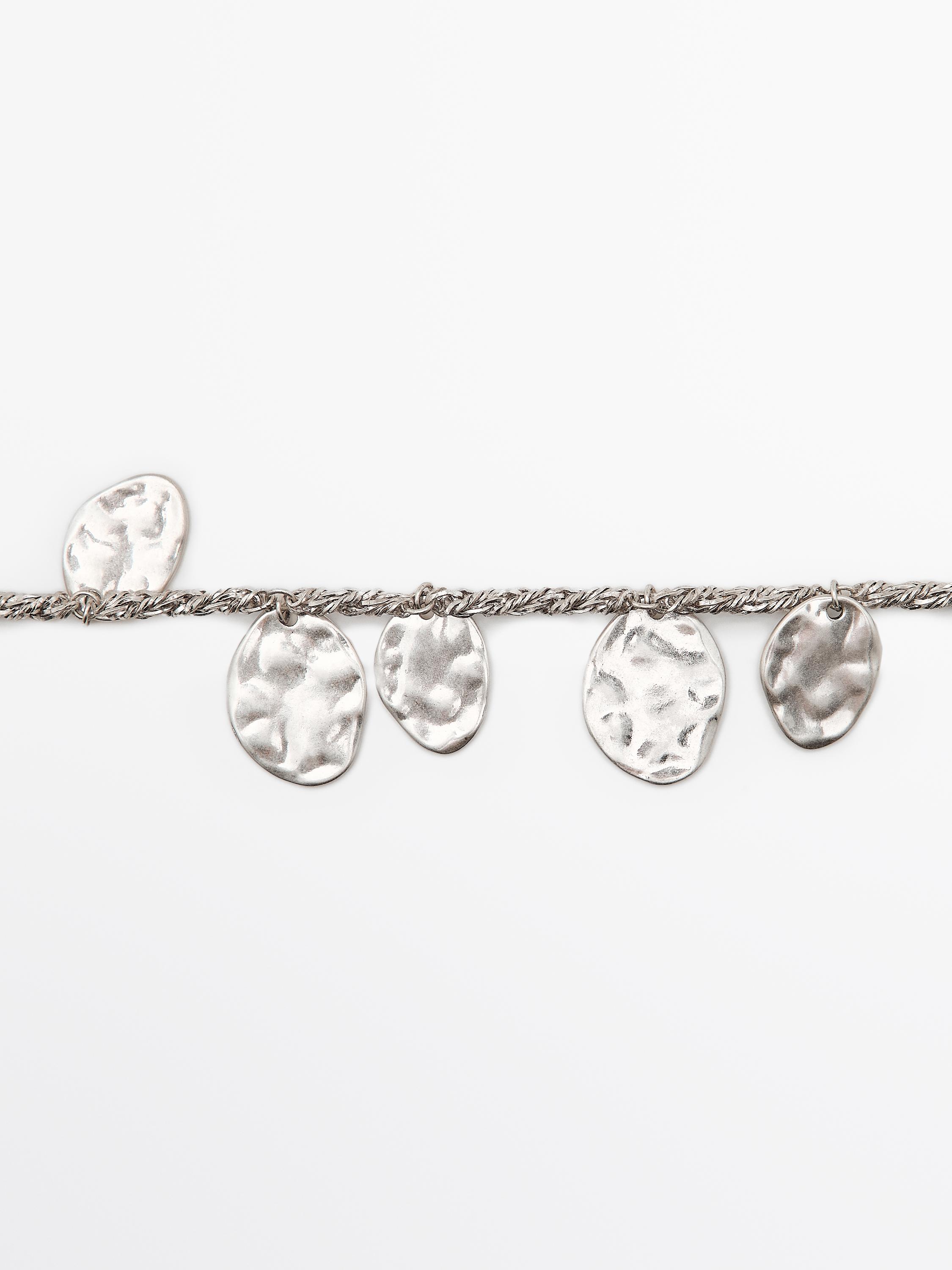 Bracelet pièces de monnaie